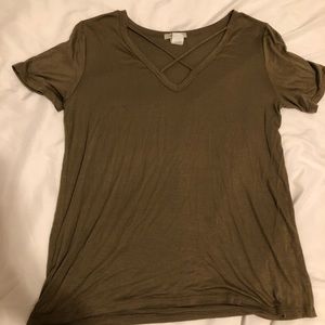 Green shirt with cross